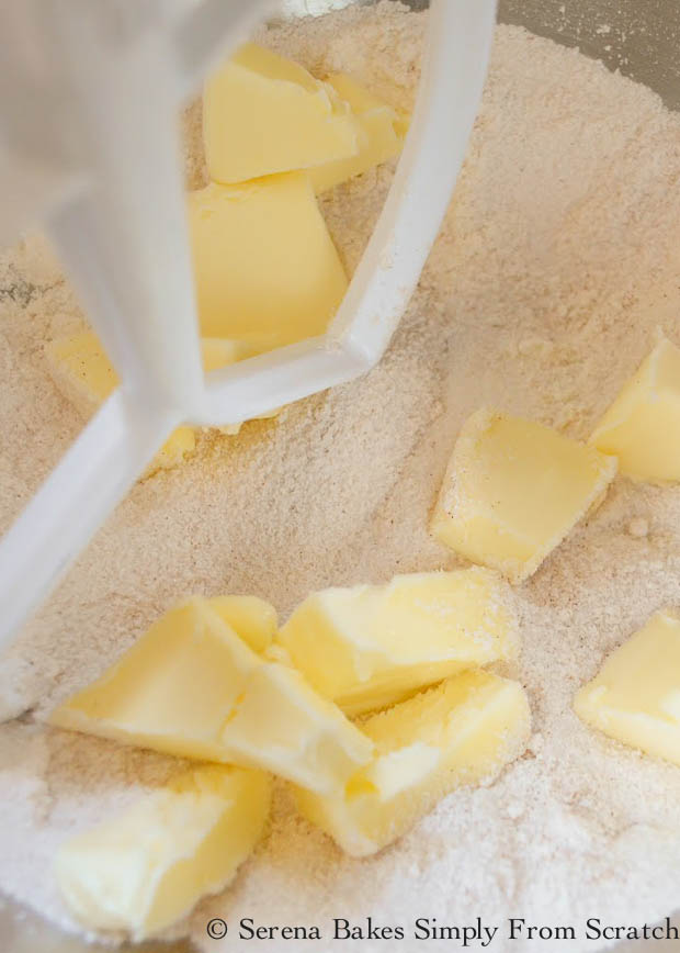 Add butter to flour mixture to make crumble topping.