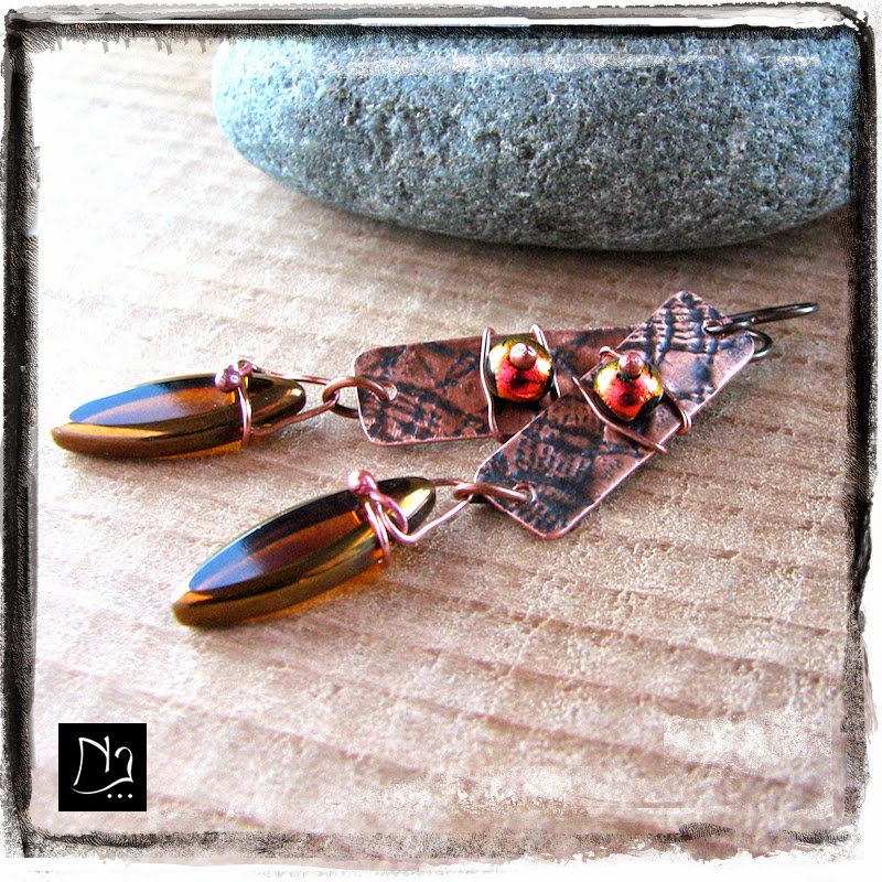 http://www.nathalielesagejewelry.com/collections/handcrafted-earrings/products/fire-dichroic-glass-copper-drops-earrings