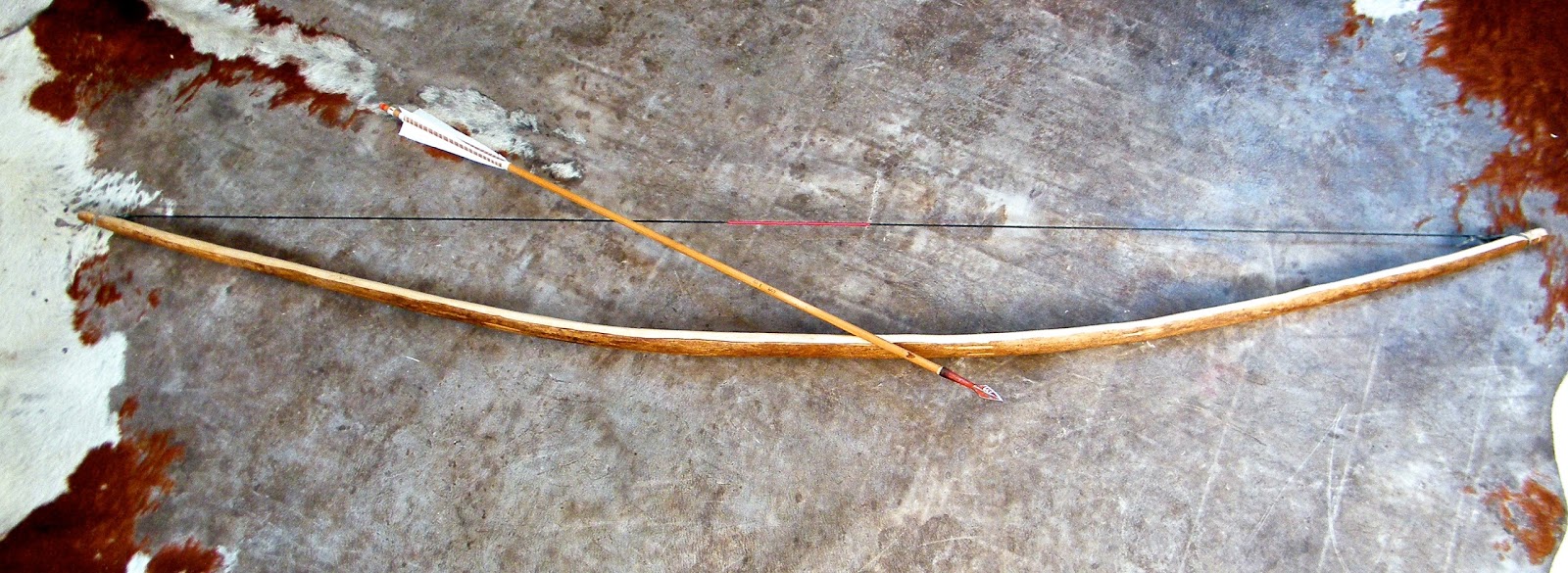 SELF MADE ASH HUNTING BOW #50 @ 30" WITH THE TREE BARK LEFT ON.
