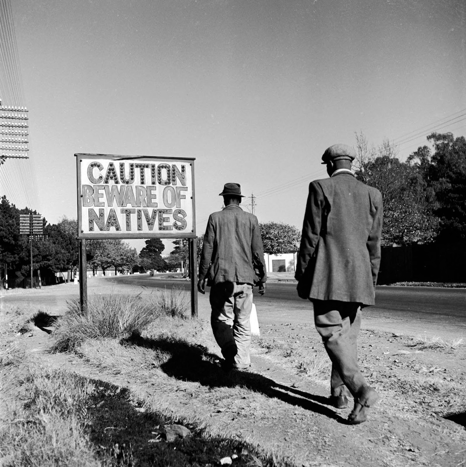 A sign common in Johannesburg. 1956.