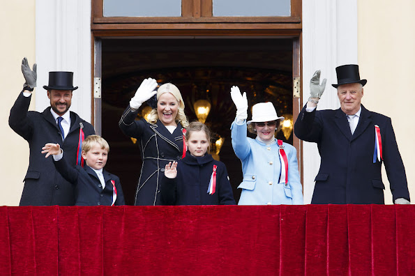 King Harald and Queen Sonja, Crown Prince Haakon of Norway and Crown Princess Mette-Marit of Norway with Princess Ingrid Alexandra, Prince Sverre Magnus and Marius Borg Høiby greet the Childrens Parade on the Skaugum Estate 