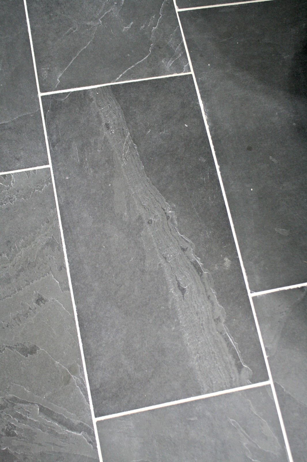 How To Tile A Bathroom Floor It S Done From Thrifty Decor Chick