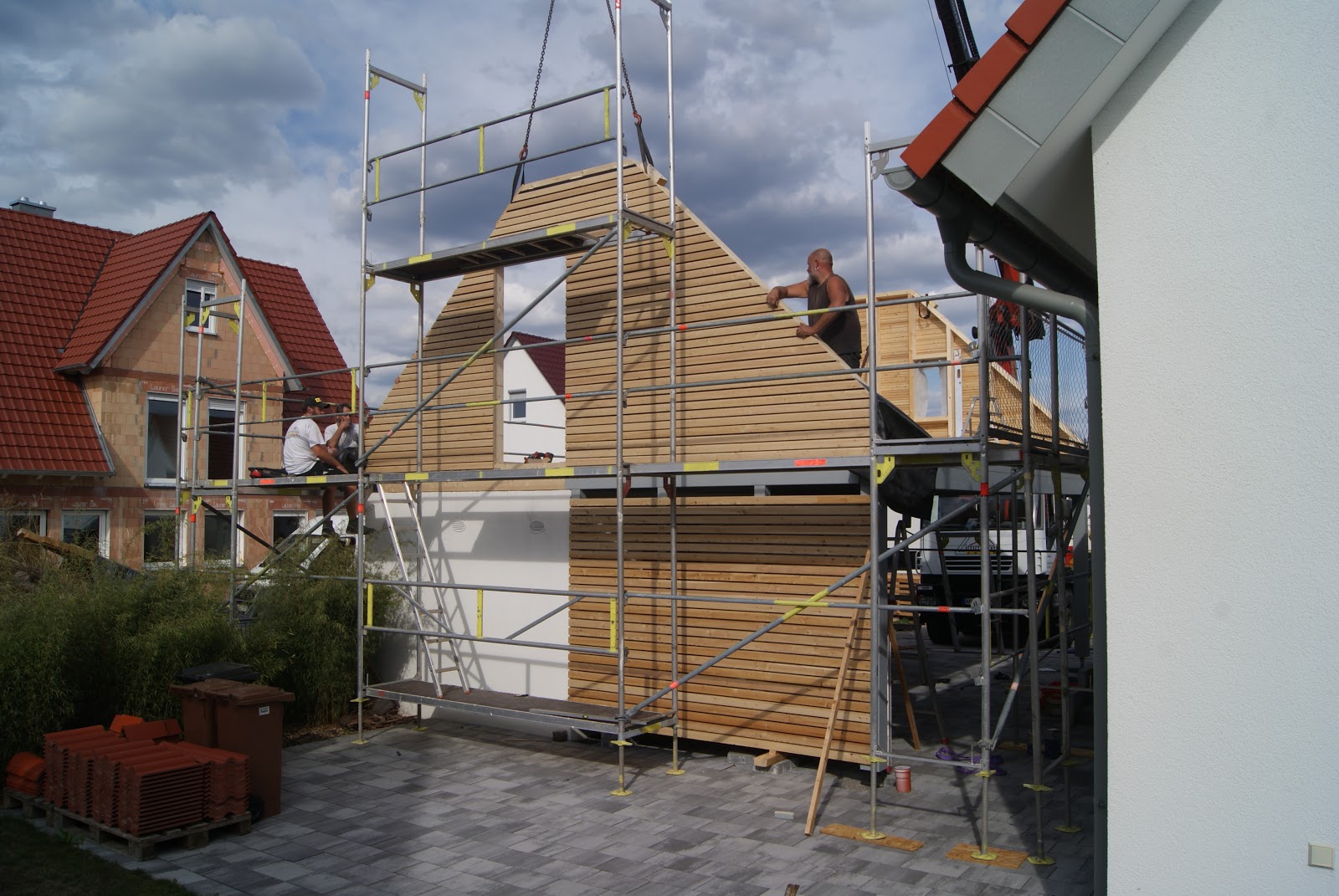 Carport + Dach über Garage und Carport