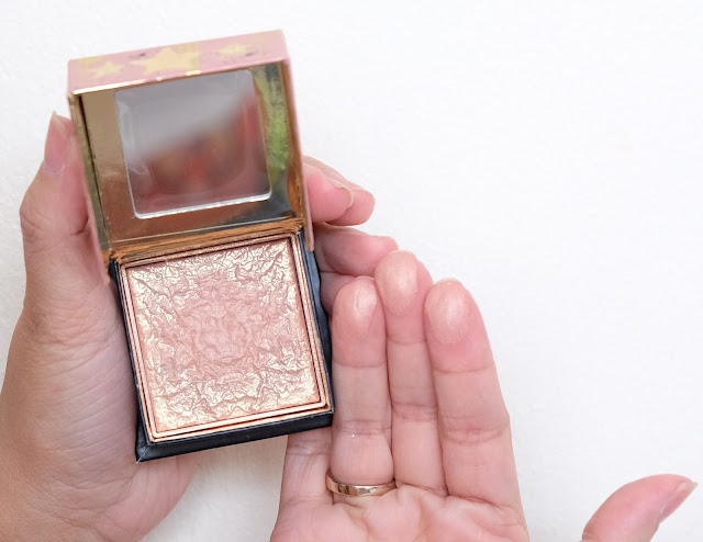 a swatch photo of Benefit Gold Rush review.
