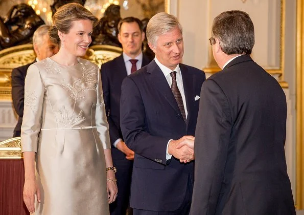 King Philippe and Queen Mathilde hosted traditional New Year reception at the Royal Palace. Queen wore Natan dress and pumps