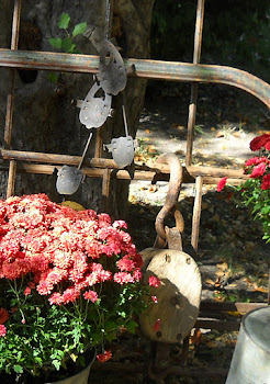 Vintage Ice Skates, Barn Pulley and Metal Bed