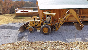 George working on his new driveway