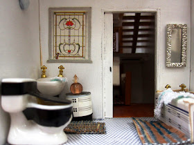 Bathroom of an Art Deco moderne-style dolls house by Anne Reid