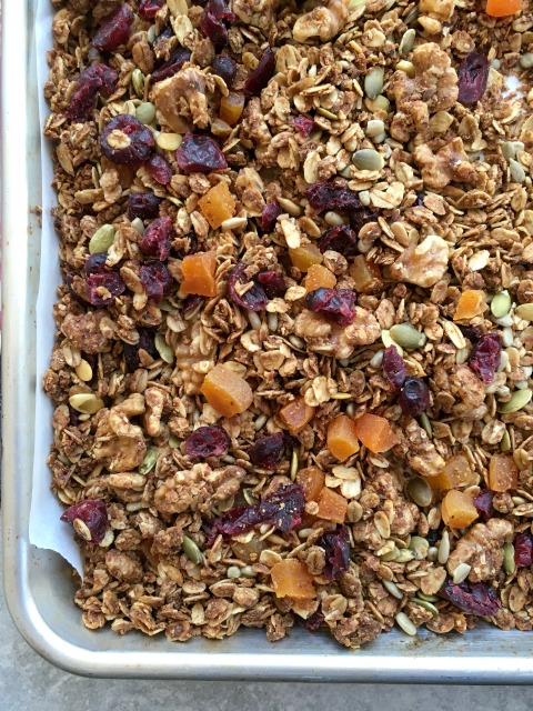 Super Healthy Granola for Everyday Snacking; includes nuts, seeds, coconut, dried fruit and old fashioned rolled oats. Naturally sweetened with molasses and maple syrup. Very little added fat.