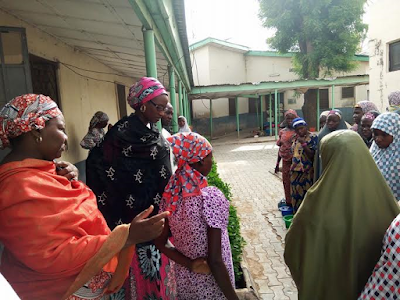 Photos of young VVF patients carrying bowls at Murtala Muhammad Hospital, Kano