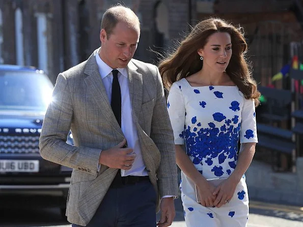 Kete Middleton and Prince William visit Luton. Kete Middleton wore LK. Bennett Lasa dress, and Clutch and Pumps - shoes