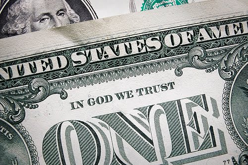 Lema "En Dios Confiamos" en dólar