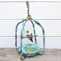http://www.pillarboxblue.com/gorgeous-spring-fabric-birdcage/