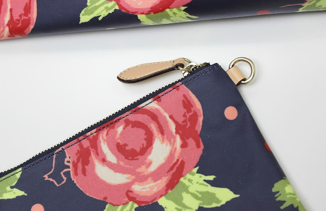 The Radley Autumn Rose Detachable Pouch is perfect for all your gadgets and makeup must-haves