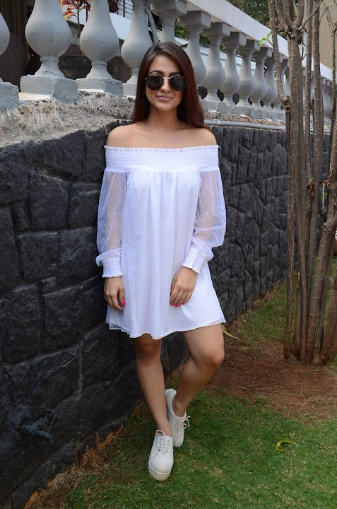 Aksha Pardasany in white dress