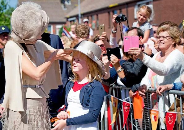 Dutch Queen Maxima launched National campaign of the 11th Neighbour's Day (Burendag). Queen Maxima wore Natan Dress, hat