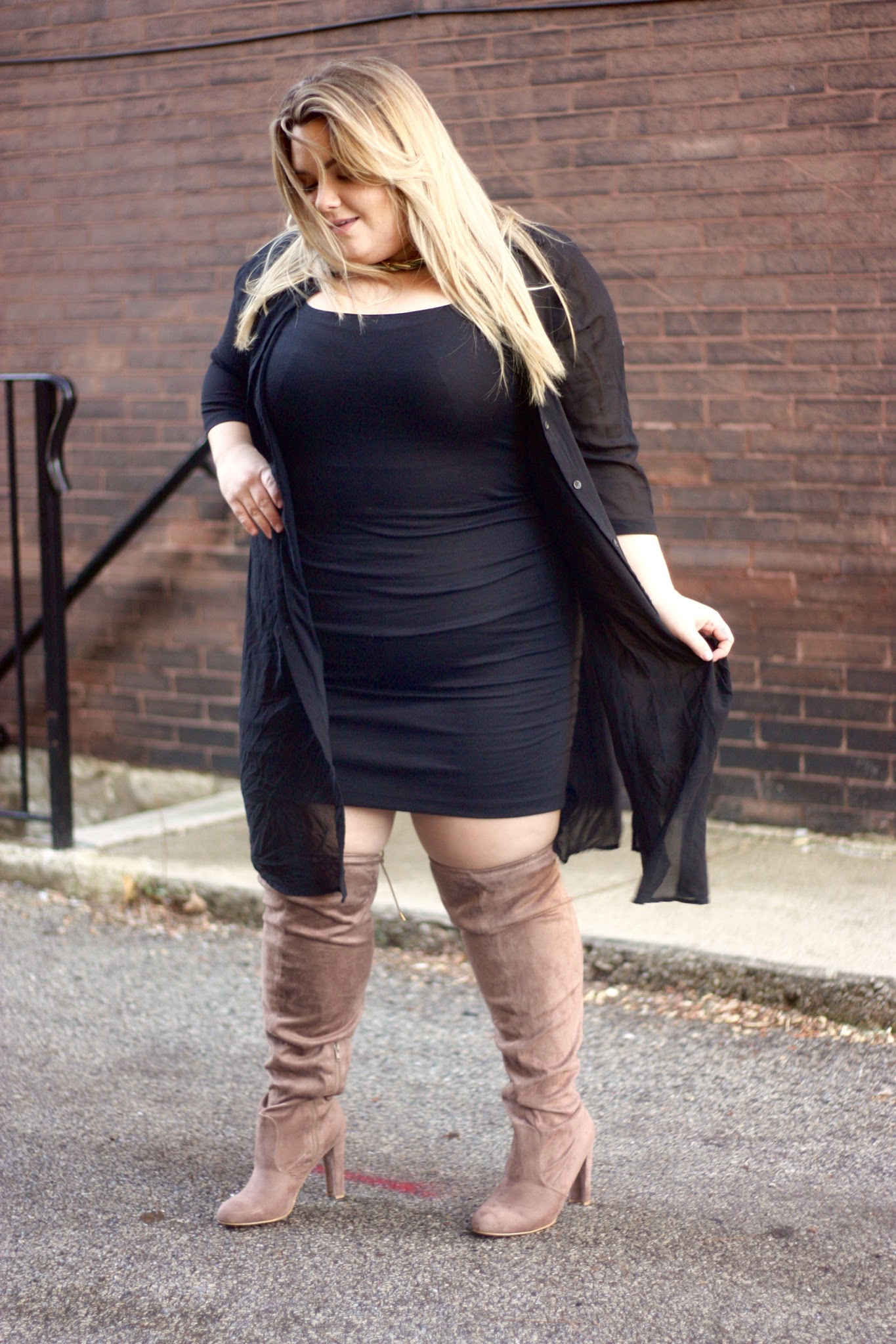 Natalie in the City shares cute thigh high wide calf boots and styles a plus size dress with knee high boots.