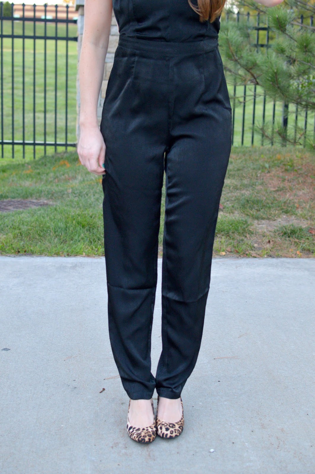 black jumpsuit with wedges
