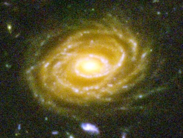 26 Pictures Will Make You Re-Evaluate Your Entire Existence - HERE’S ONE OF THE GALAXIES PICTURED, UDF 423. THIS GALAXY IS 10 BILLION LIGHT YEARS AWAY. WHEN YOU LOOK AT THIS PICTURE, YOU ARE LOOKING BILLIONS OF YEARS INTO THE PAST