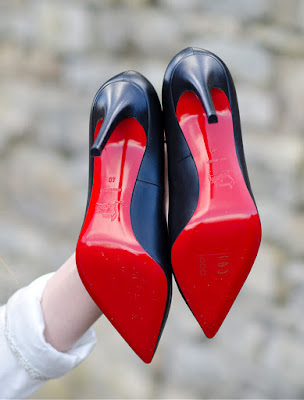 black pumps with red underneath