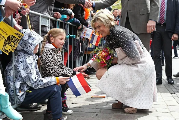 King Willem-Alexander, Queen Maxima, Princess Amalia, Princess Alexia and Princess Ariane, Princess Laurentien attend the 2016 Kings Day celebration in Zwolle. Pili Carrera Dress, Zara Lace Dress