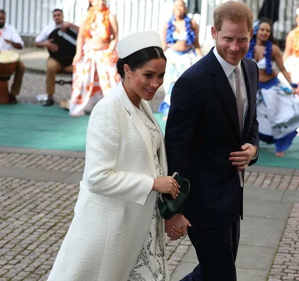 Meghan Markle wore Victoria Beckham printed crepe long sleeve midi dress, Kate Middleton wore a red coat by Catherine Walker