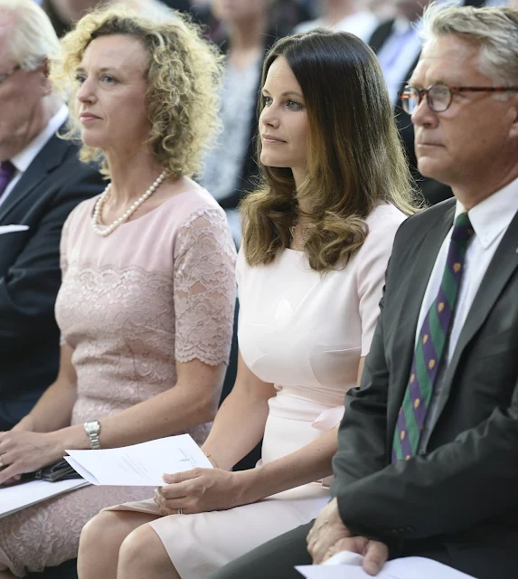 Swedish Princess Sofia attends graduation ceremony for sophia sisters at Stockholm City Hall. Princess Sofia wore dress