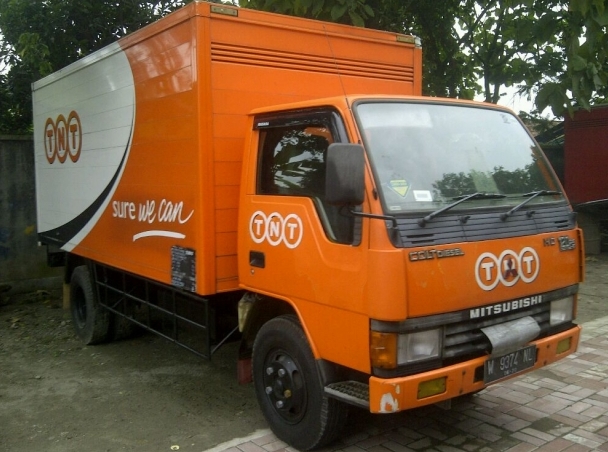 Truk Ragasa Modifikasi-oranye putih