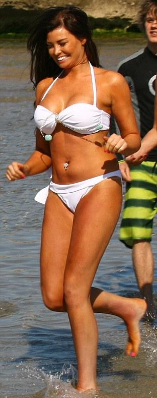 Jessica Wright shows off her assets in a white bikini