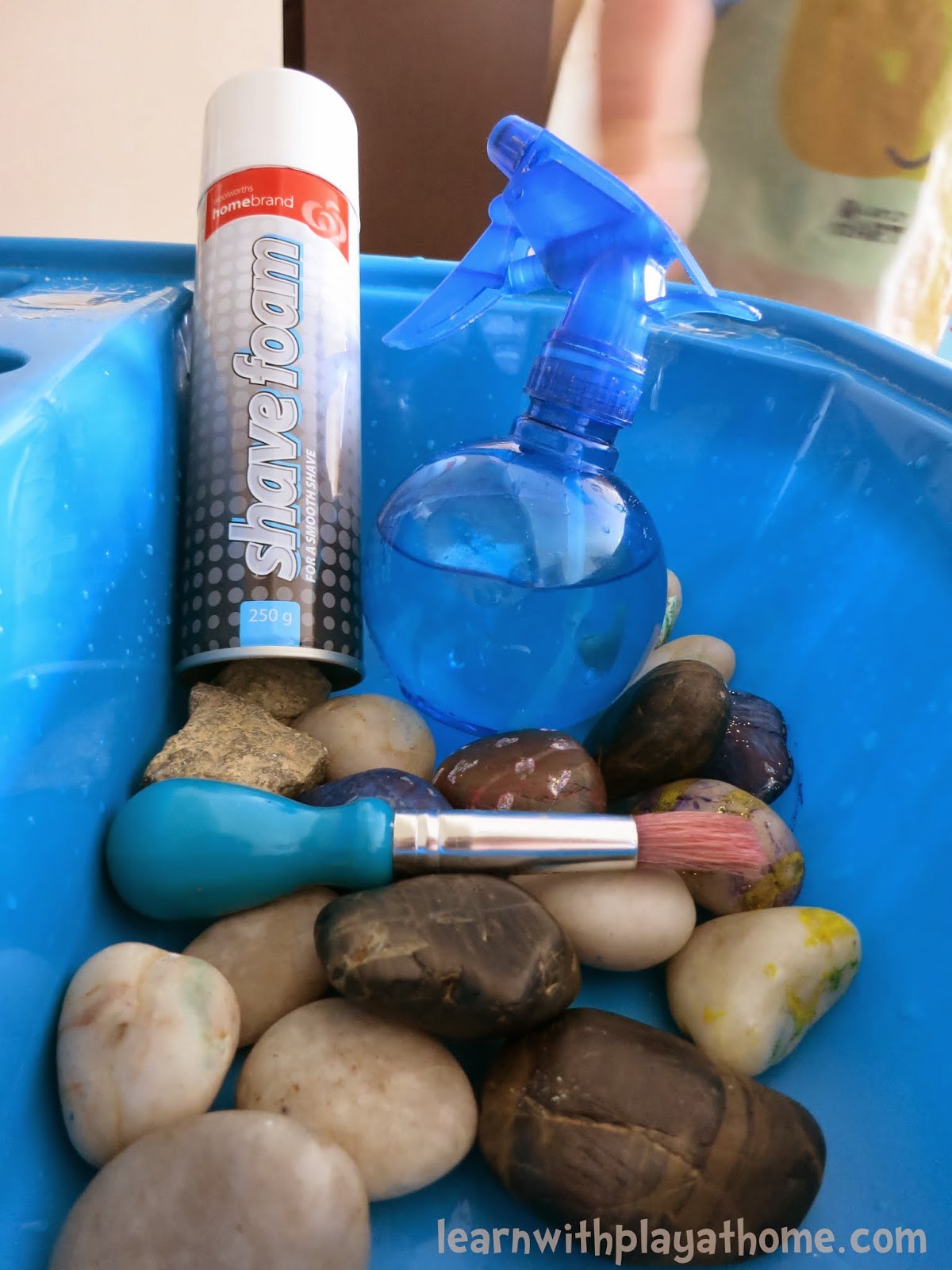 Learn with Play at Home Clean the Rocks. Toddler Sensory Play