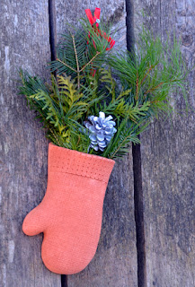 Christmas mitt with greenery