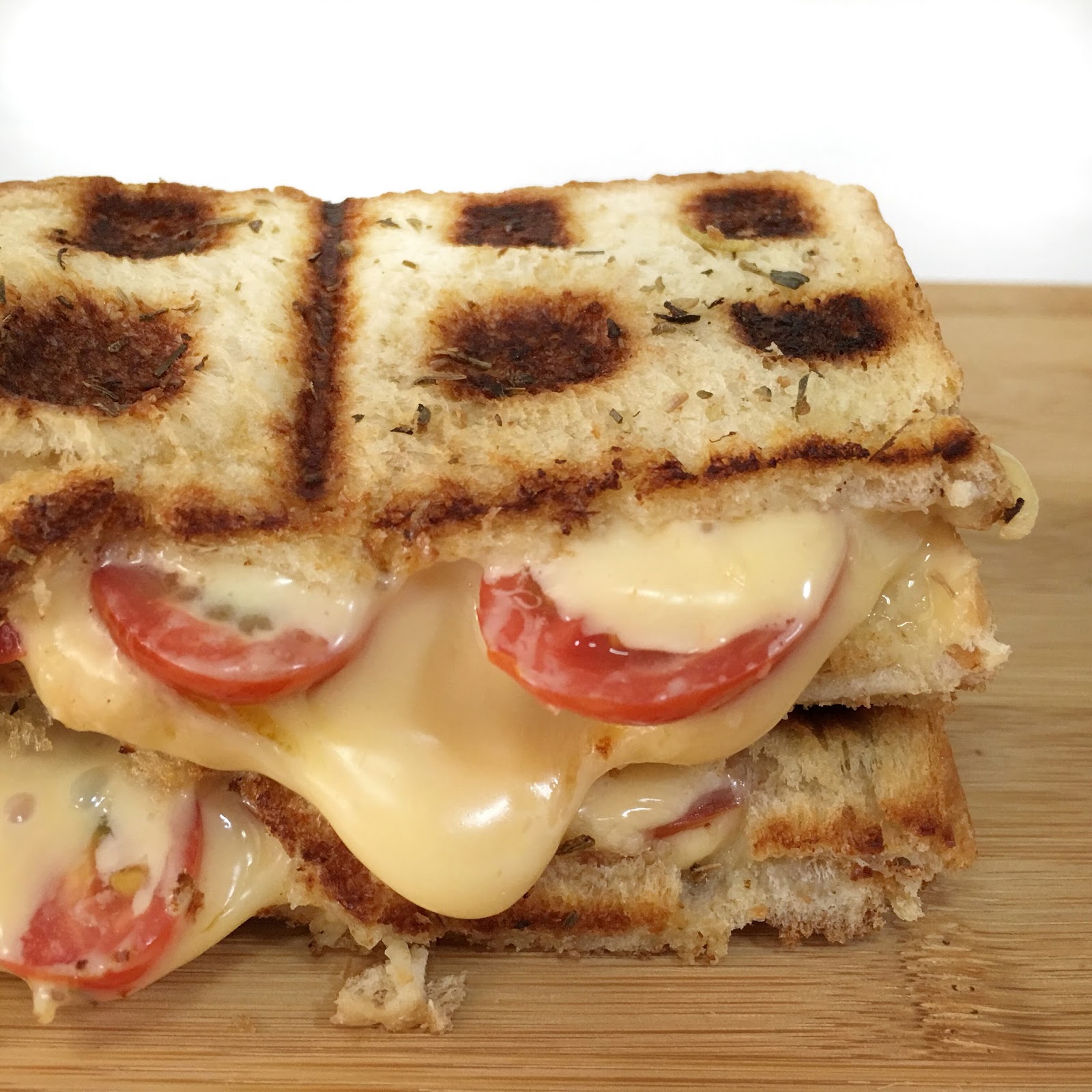 grilled cheese and tomato waffle toastie
