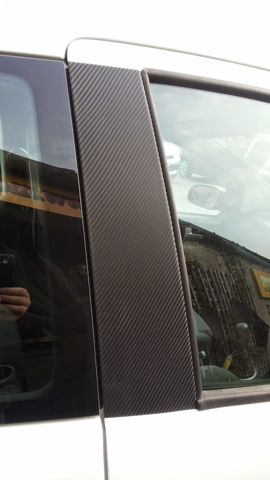 The Green I Signs Blog Carbon fiber wrapped VW fox door pillars
