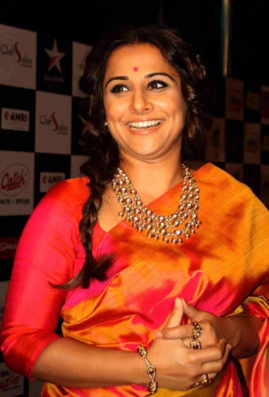 Vidya Balan Photos In Transparent Yellow Sari At Mirchi Music Awards