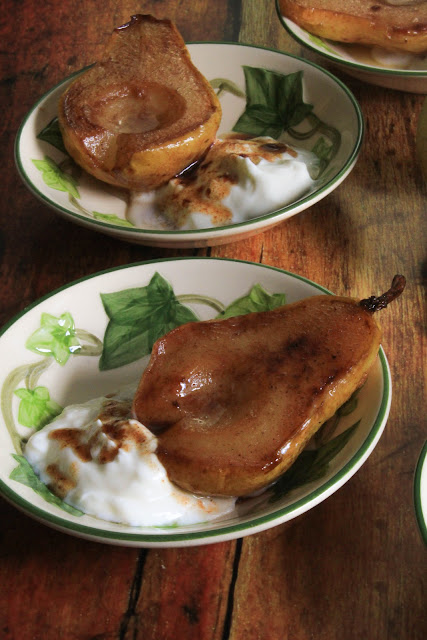 Roasted Cinnamon Buttery Pears, simple dish showcasing the straightforward flavor of pears.  They are buttery slightly sweet served as an accompaniment to pork, garnished in a winter salad, but also makes an elegant dessert for a fall dinner party, bridal brunch and quick weeknight snack.