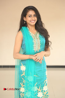 Actress Nithya Pictures in Green Salwar Kameez at Nandini Nursing Home Audio Success Meet  0001
