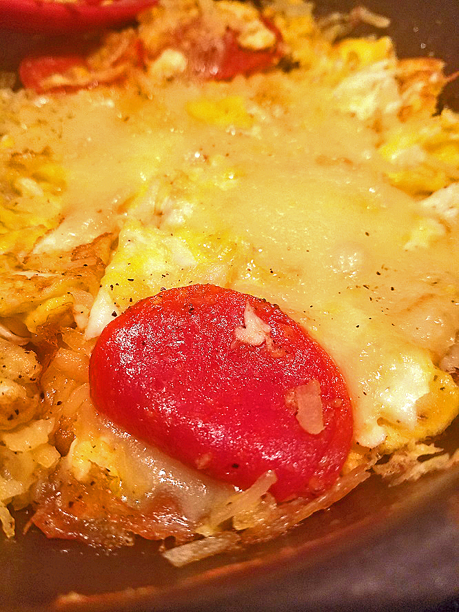 This is how to make frittata on the stove top. It is an Italian breakfast with pepperoni, eggs and potatoes.