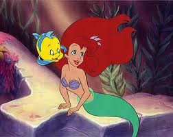 Ariel with hair blowing back The Little Mermaid 1989 animatedfilmreviews.blogspot.com