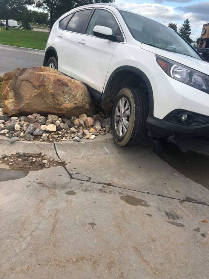 Someone Placed A Giant Stone To Prevent Drivers From Cutting The Corner, And The Results Were Hilarious