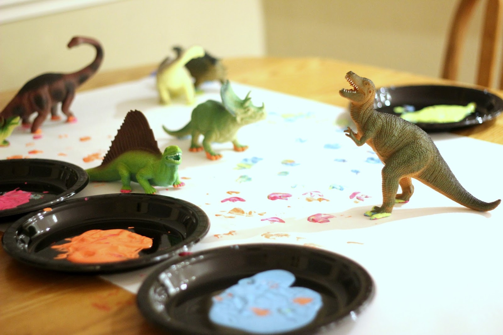 Toddler Approved! Painting with Toy Dinosaurs