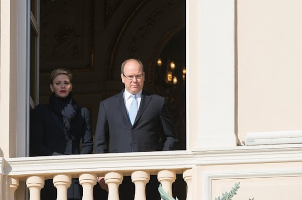 Princess Charlene and Prince Albert II of Monaco appear on the balcony of the prince's palace during the Sainte Devote festivities