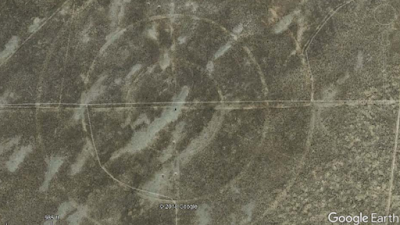 Strange symbol etched in to the ground as seen from Google Earth. Strange symbol etched in to the ground as seen from Google Earth.