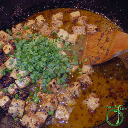 Morsels of Life - MaPo Tofu Step 8 - Throw in green onions, cooking until just wilted. Serve over rice and garnish with additional green onions if desired.