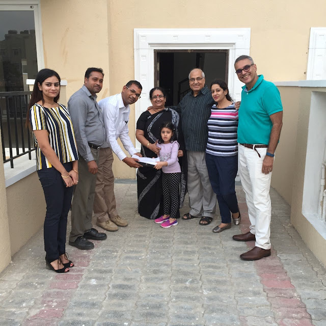 An Emaar MGF customer taking handover of his unit at Emerald Hills Sector-65 on Golf Course Extension Road An Emaar MGF customer taking handover of his unit at Emerald Hills Sector-65 on Golf Course Extension Road