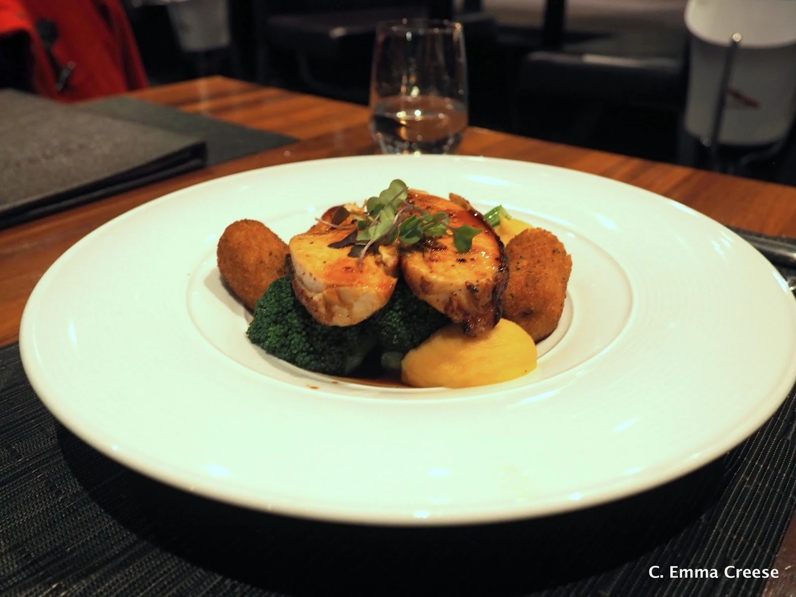 A collage of photos showcasing different types of cuisine from various Auckland restaurants.