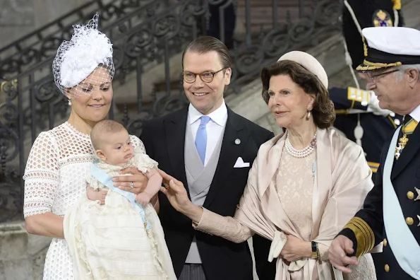 Queen Silvia and King Carl Gustaf of Sweden, Crown Princess Victoria, Prince Daniel, Princess Estelle, Princess Madeleine of Sweden with daughter Princess Leonore and Christopher O'Neill, Prince Carl Philip and Princess Sofia, Prince Haakon and Princess Mette-Marit of Norway, Crown princess Mary and Prince Frederik of Denmark, Ewa and Olle Westling at the christening of Prince Oscar of Sweden at the Royal Chapel in Stockholm.Antonio Berardi Blue Cape-back Stretch Crepe Dress