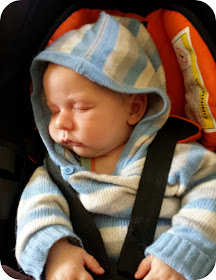 newborn in car seat, sleeping baby in carseat