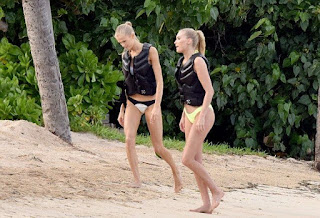 The Elsa Hosk, 27's style seriously starting to get warm in a yellow bikini on Monday, December 14, 2015, while the blazing of St. Barts sun are also irradating the inspiration poses for Lais Ribiero, 25, and Martha Hunt, 26.