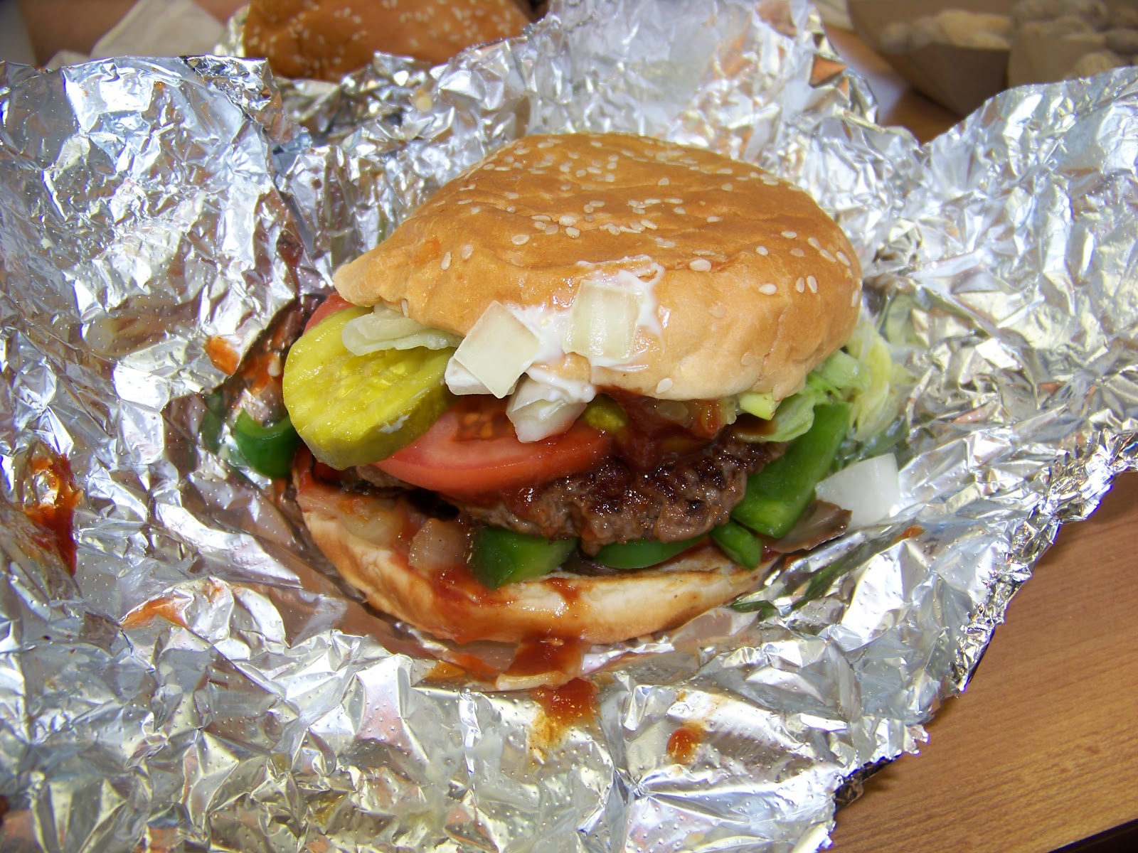 All the toppings make this five guys burger messy - but tasty!