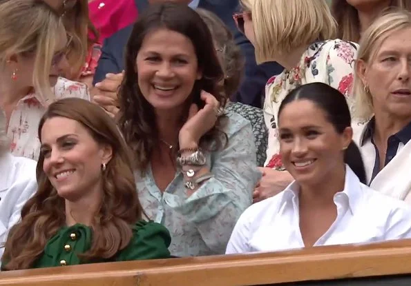 Kate Middleton wore a green midi dress by Dolce & Gabbana. Meghan Markle wore a print midi skirt by Hugo Boss